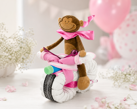 Windelmotorrad ROCKSTAR in Rosa mit Schlenkeraffe als Fahrer – Geschenk zur Geburt eines Mädchens
