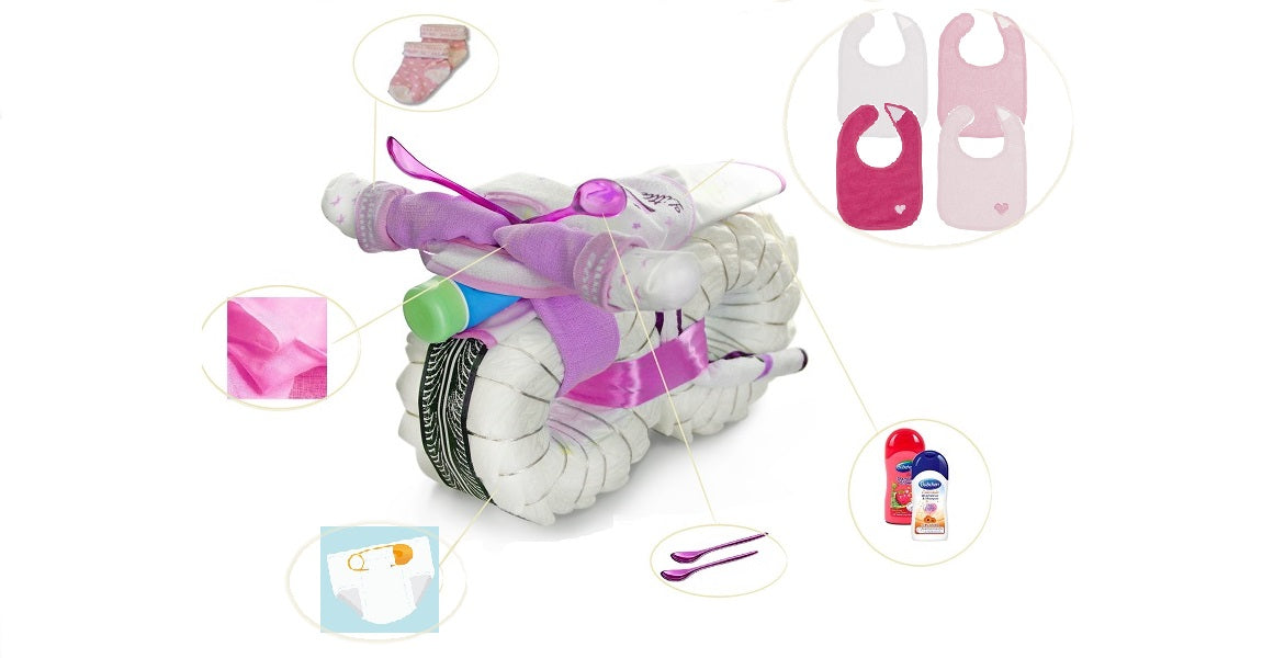 Pink ROCKSTAR diaper motorcycle with detail overview of socks, bibs, diapers, spoons and care products