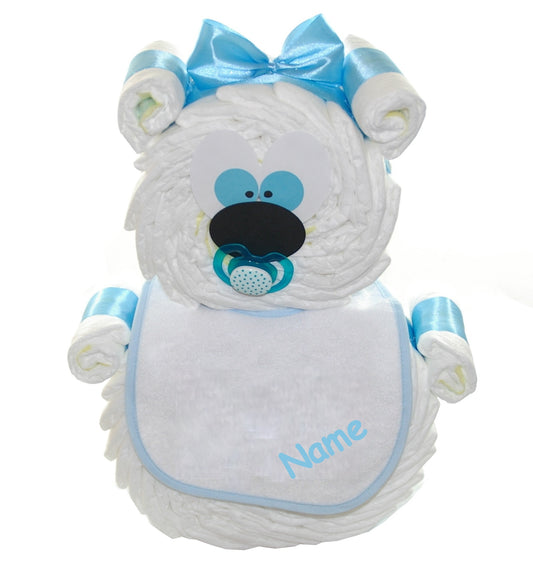 Bear made from white diapers with blue bow, pacifier and bib printed with “Name”