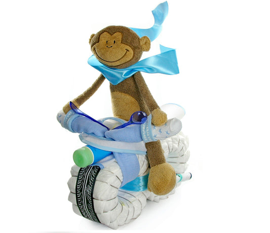 Blue ROCKSTAR diaper motorcycle with seated dangling monkey, sock handlebars and baby bottle