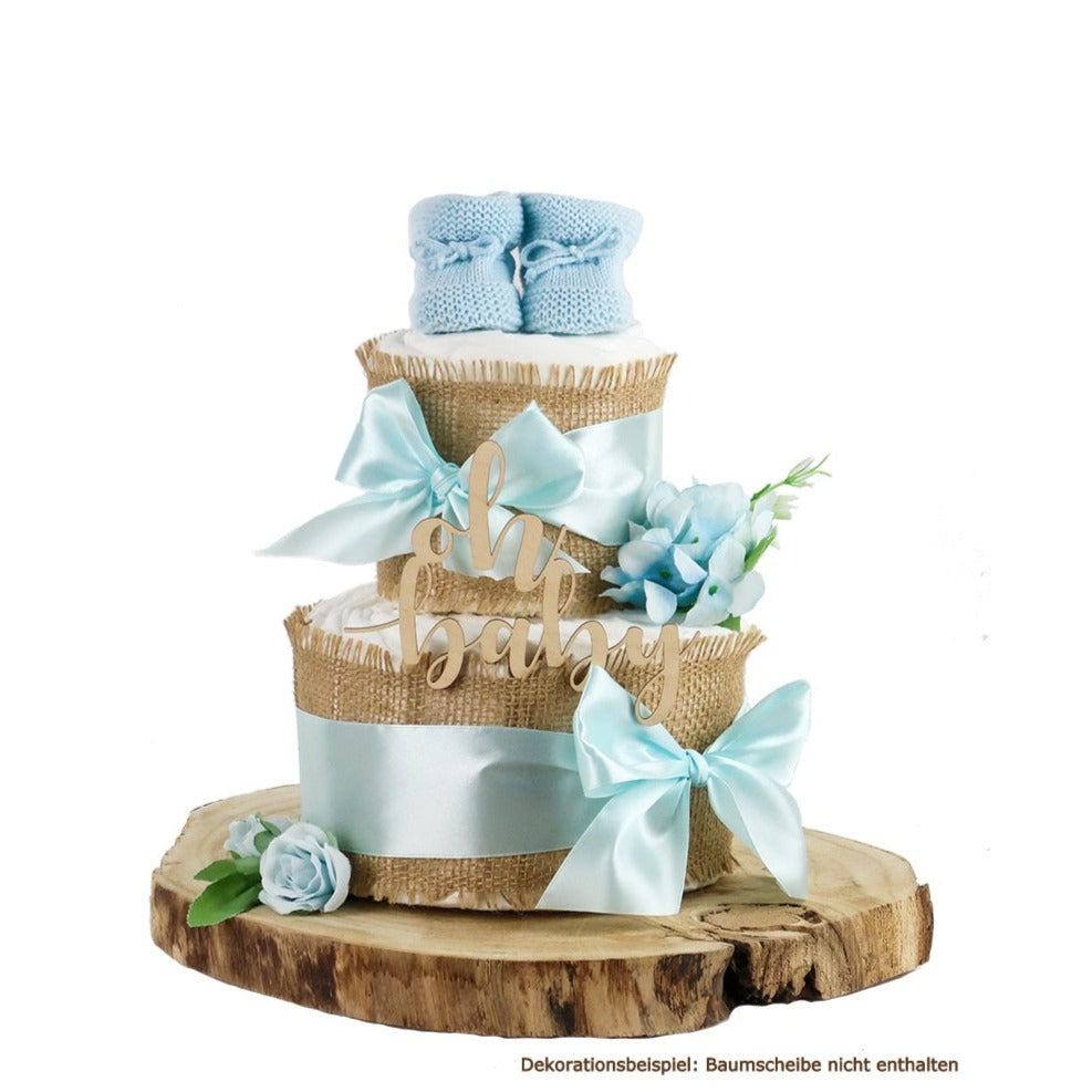 Blue diaper cake with baby booties, burlap, bows and flowers on a decorative wood slice not included