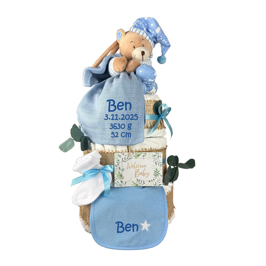 Personalized blue diaper cake with teddy, muslin cloth, baby socks, gift card and bib