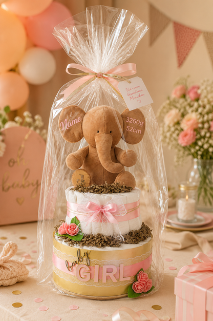 Gift-wrapped diaper cake with personalised elephant, pink bow and greeting tag