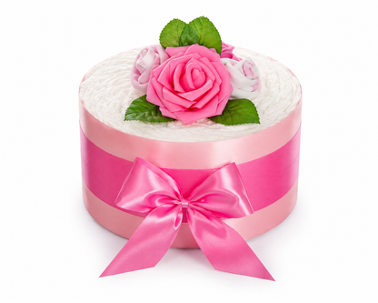 Pink diaper cake with a wide satin bow, bright rose bloom, sock roses and green leaves on white