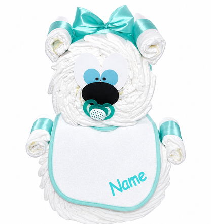 Turquoise bear made from white diapers with bow, pacifier and personalised bib