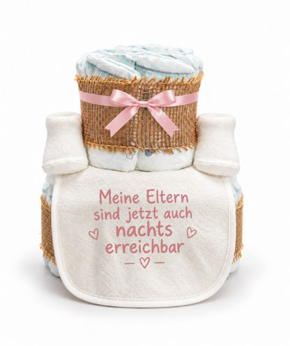 Windeltorte mit Spruch „Meine Eltern sind jetzt auch nachts erreichbar“